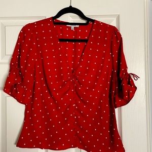 Red polka dot blouse